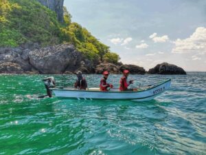 Fishermen in mud motor